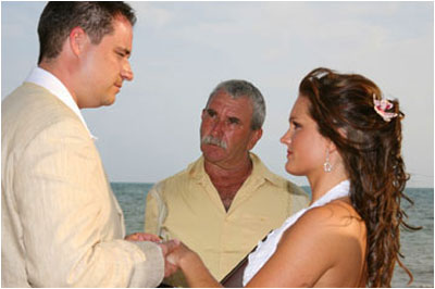 Photo of couple being wed						