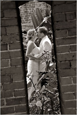 Photo of bride and groom kissing